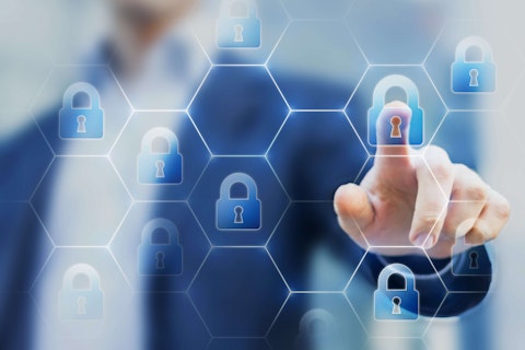 Security consultant touching a network of lock icons on a virtual screen, symbol of cybersecurity on internet and protection against cyber crime